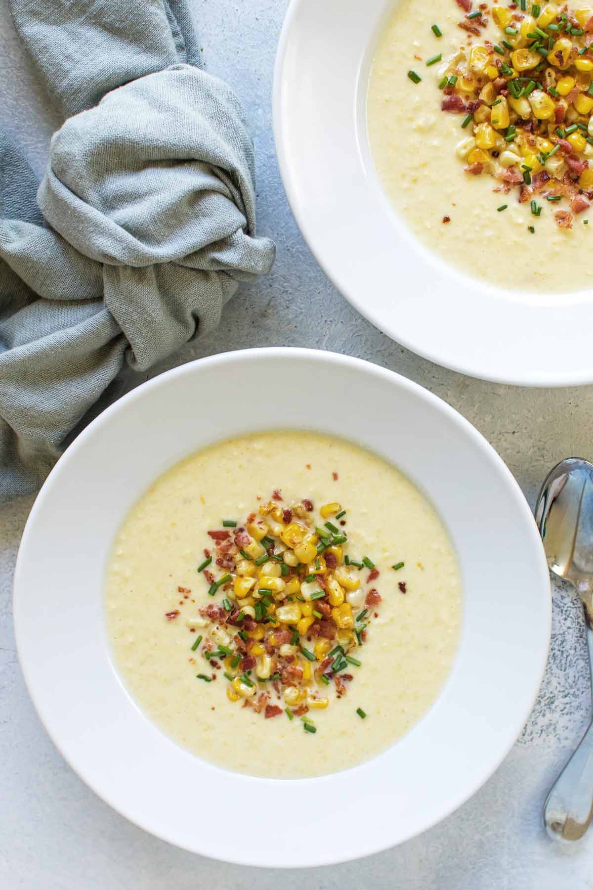 overhead photo of a bowl of soup with garnishes