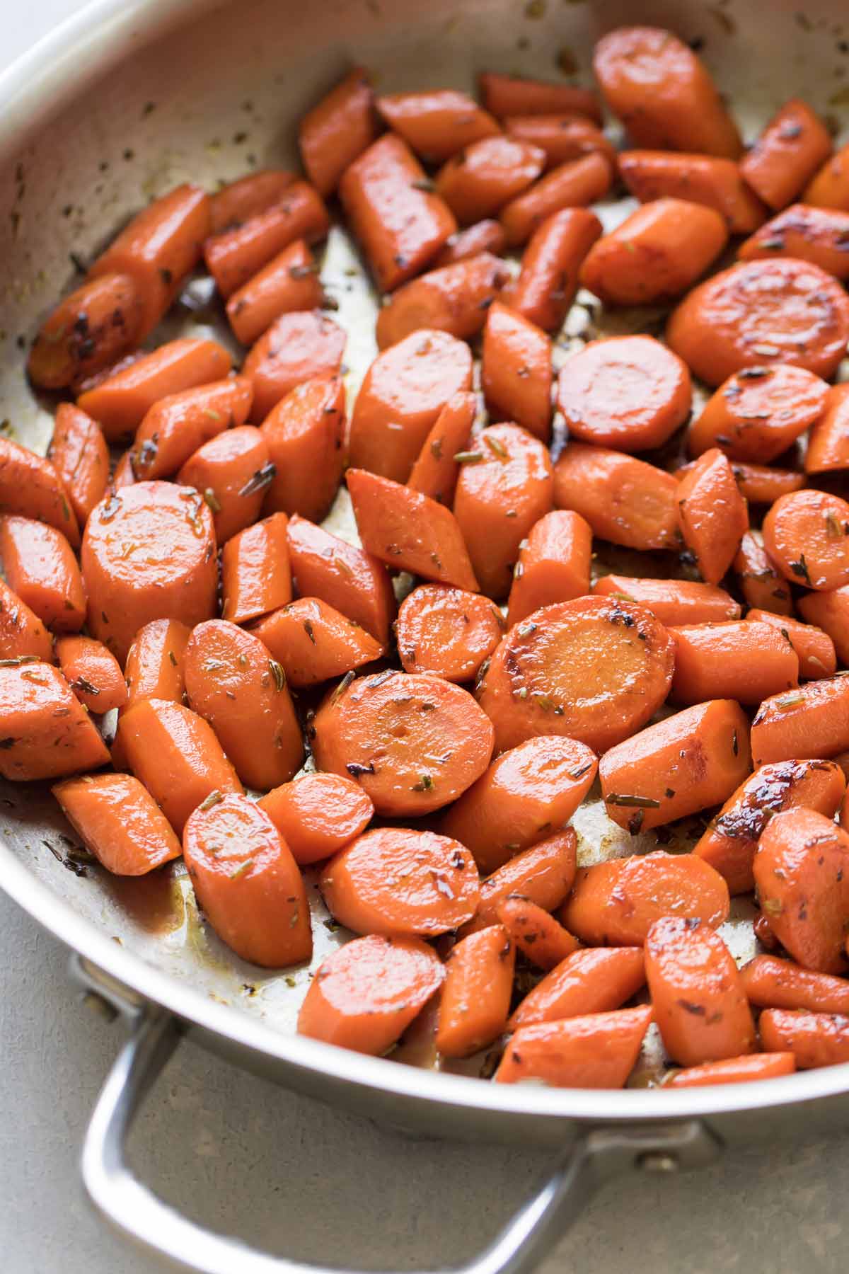honey glazed carrots in a pan.