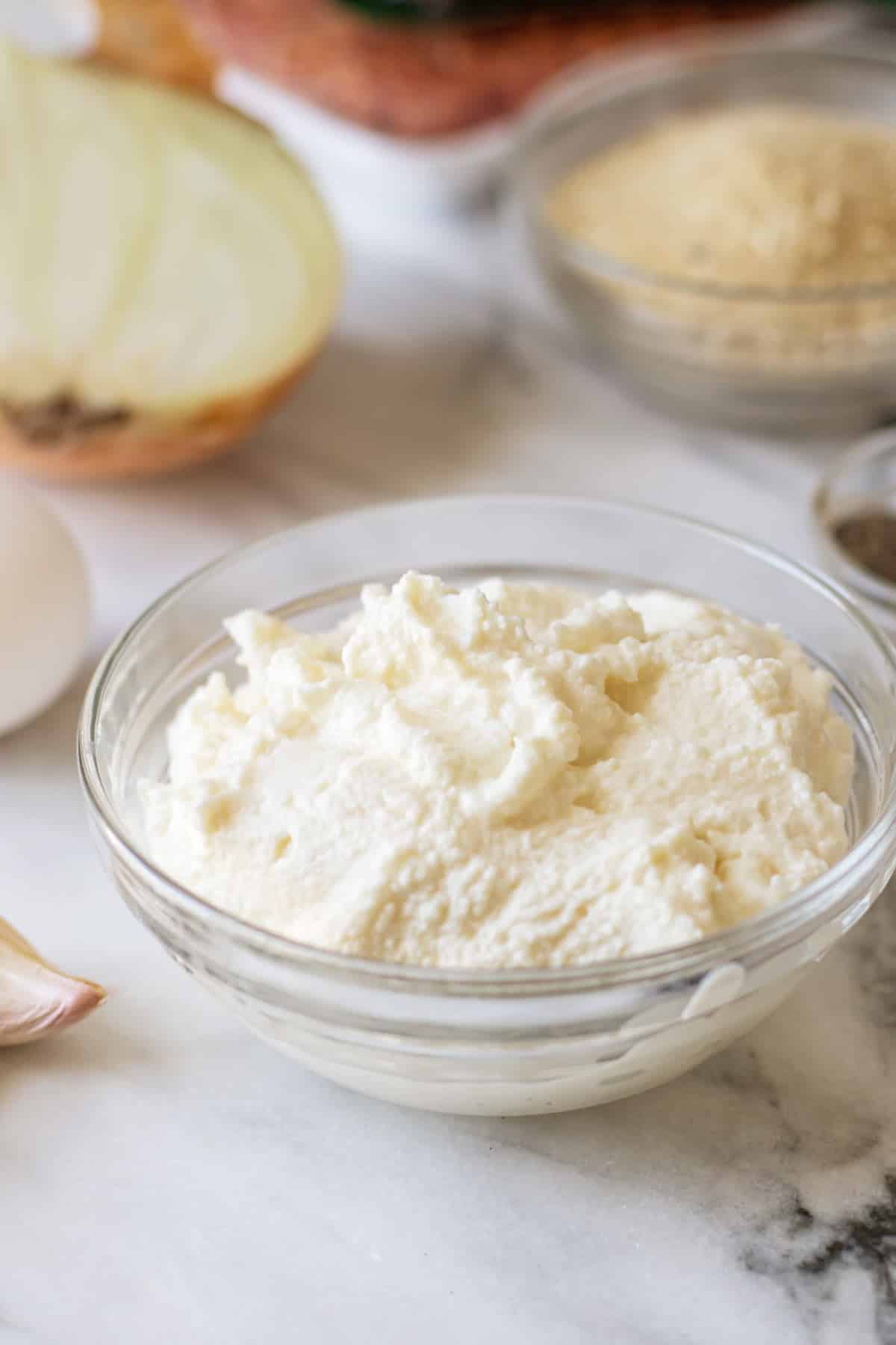 a bowl of ricotta cheese