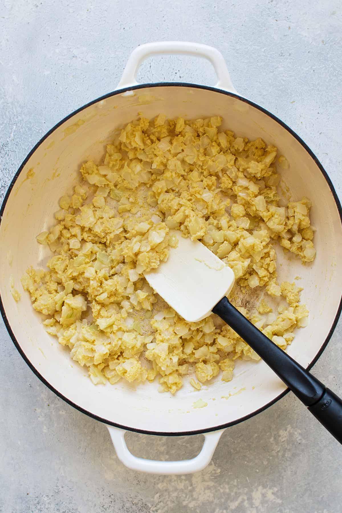 onions and masa harina in the pan