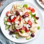 a plate of greek pasta salad.