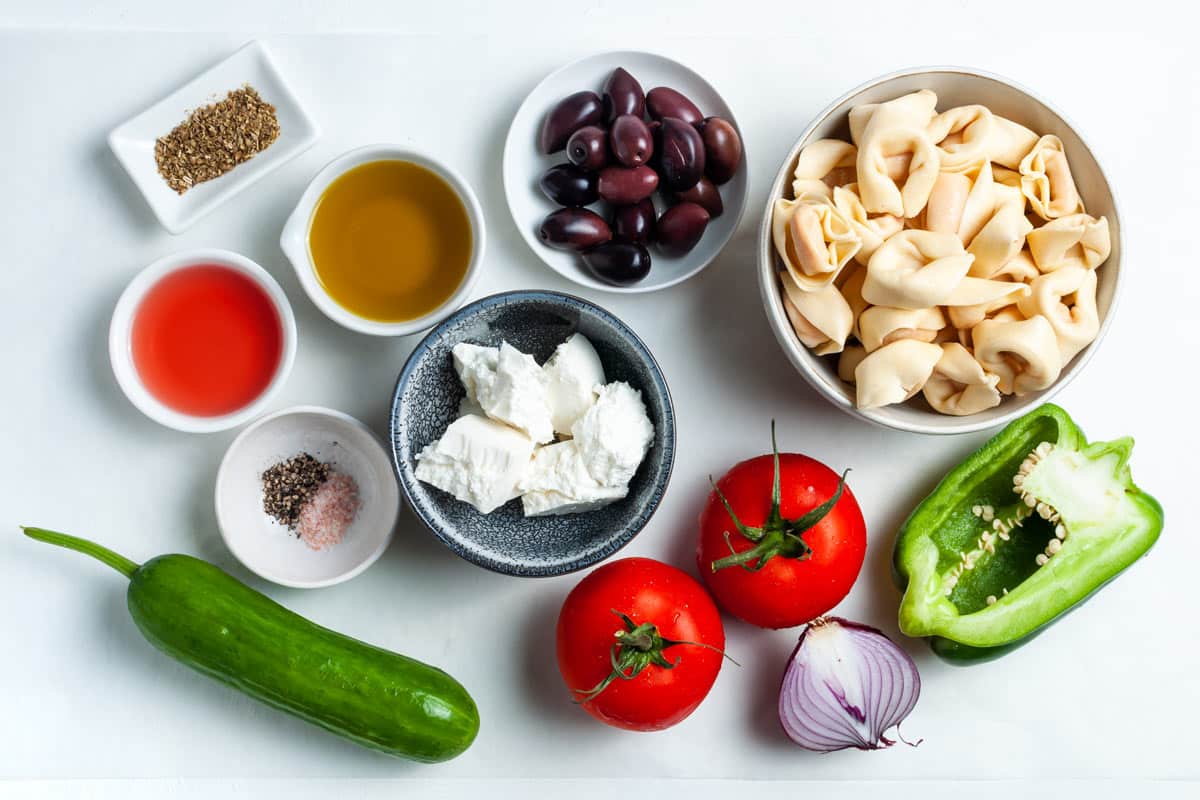 ingredients for Greek pasta salad with tortellini.