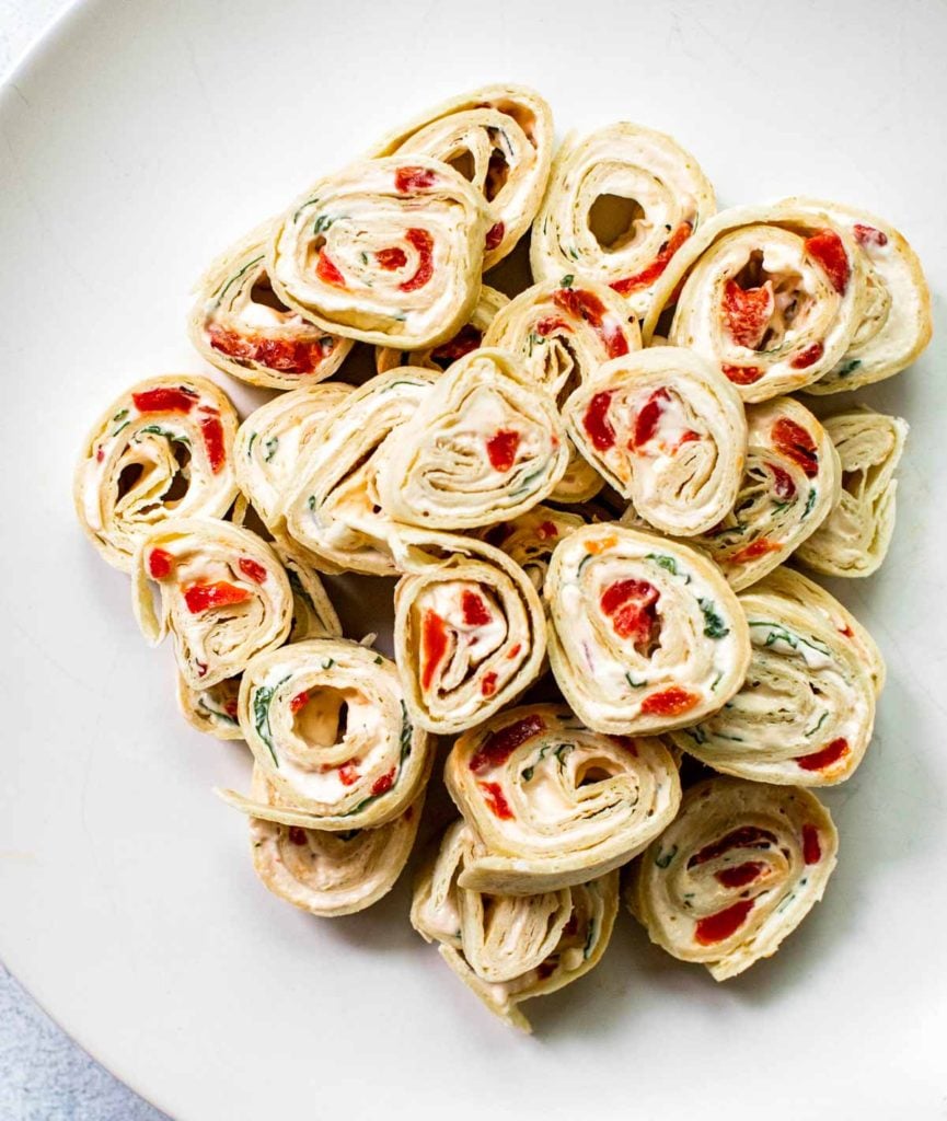 close up shot of a plate of pinwheels.