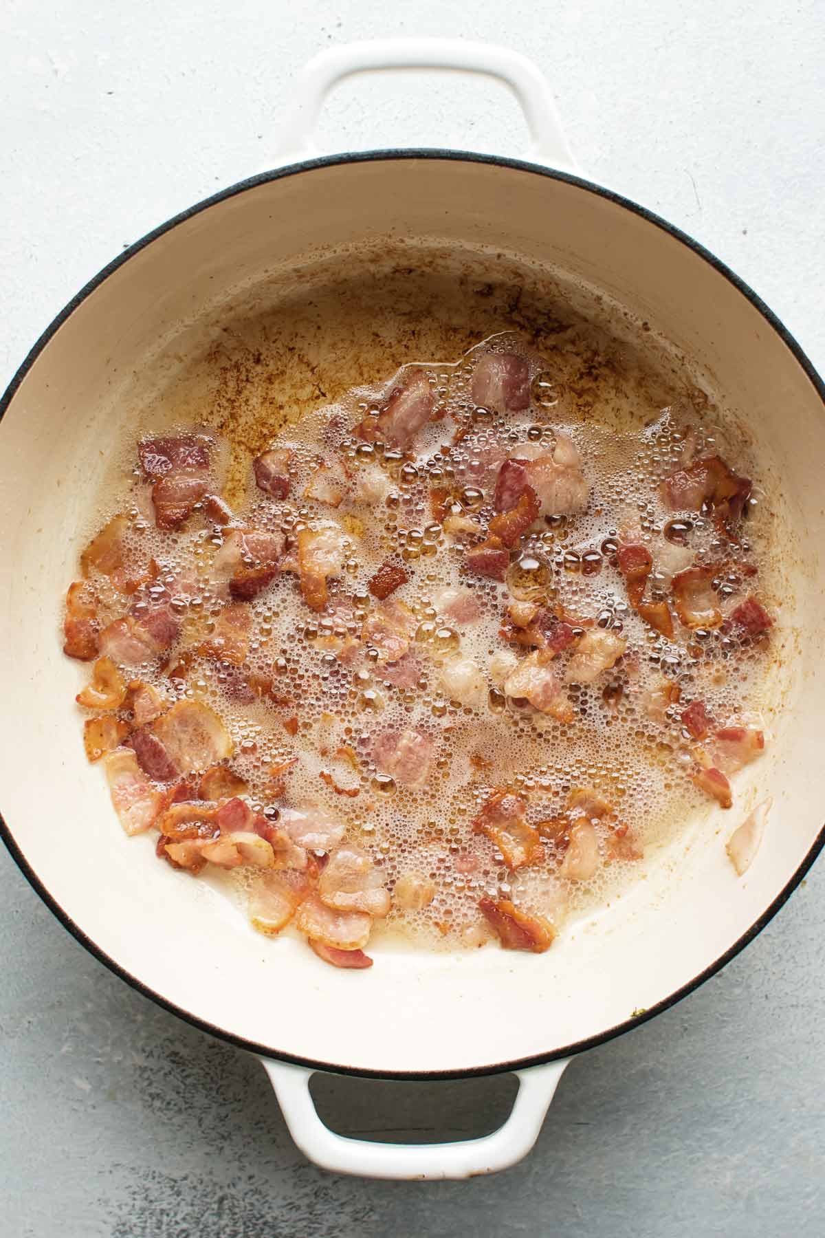 bacon cooking in a pan.