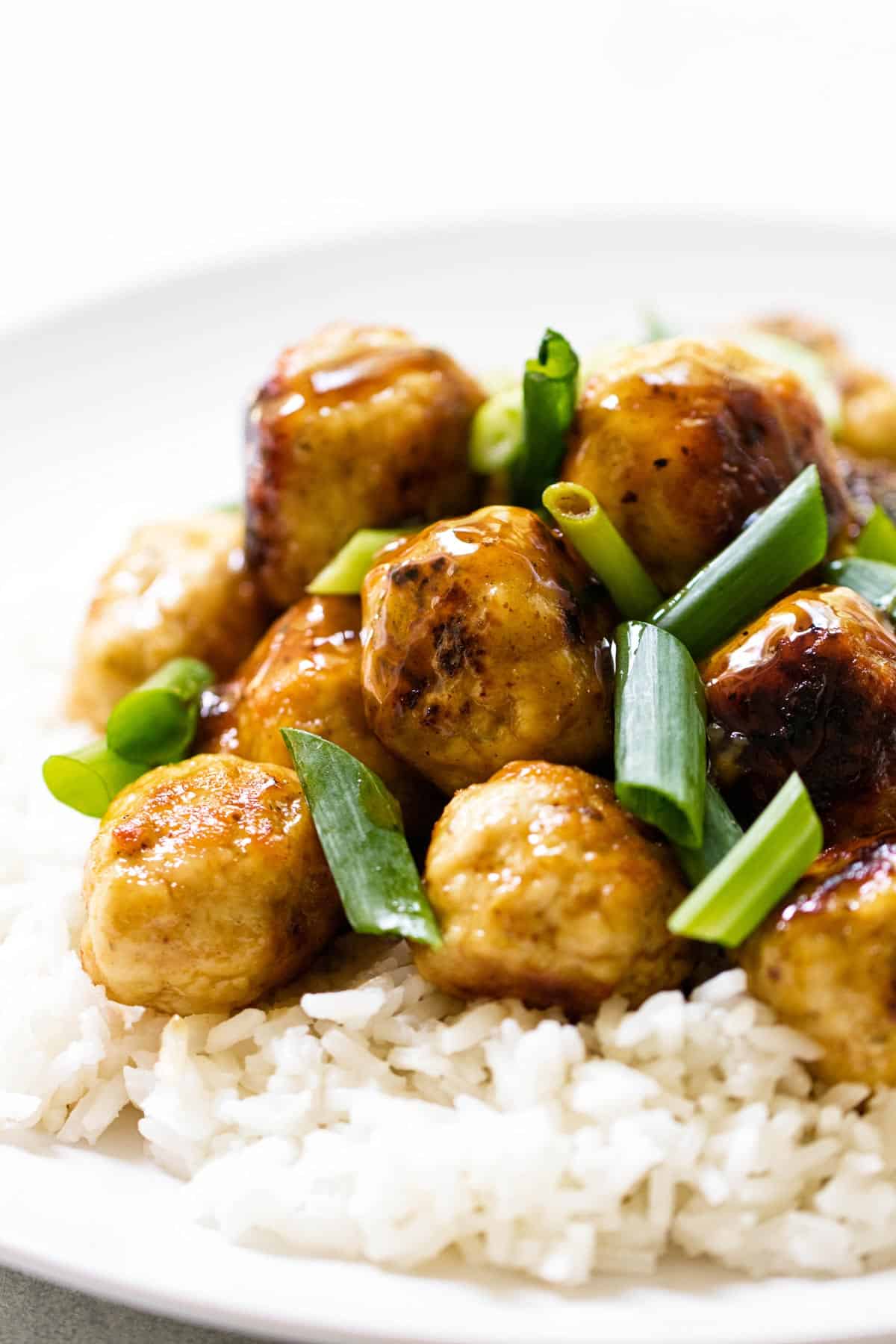 orange chicken meatballs with rice.