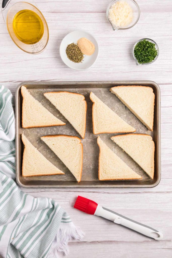 bread slices on a sheet pan.