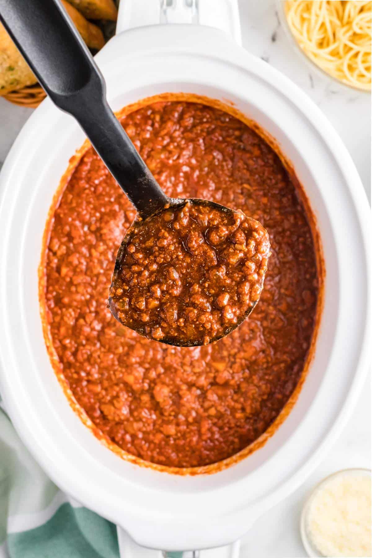 overhead photo of a ladle of sauce.
