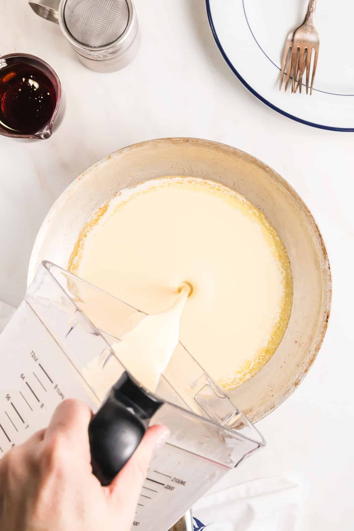 batter being poured into the pan.