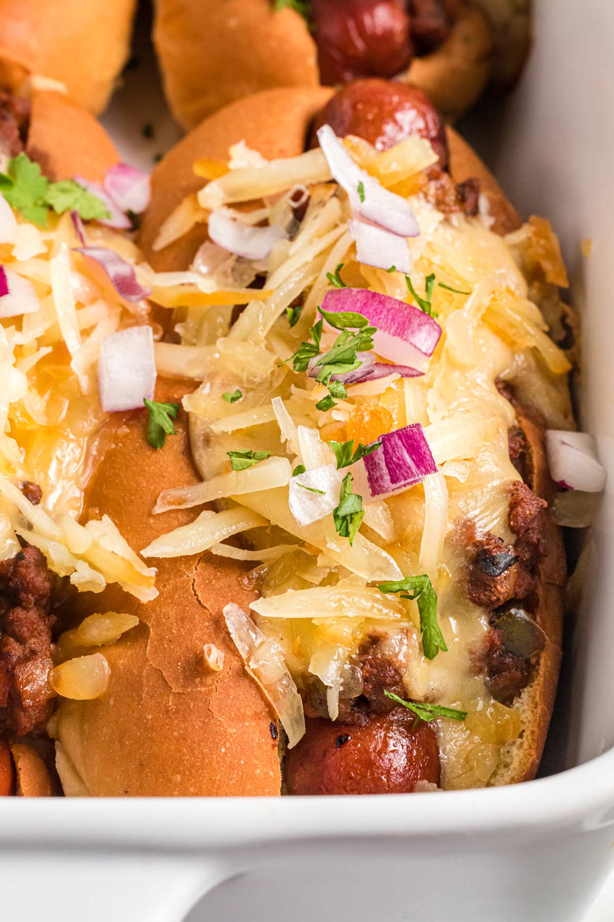 a chili dog in a pan.