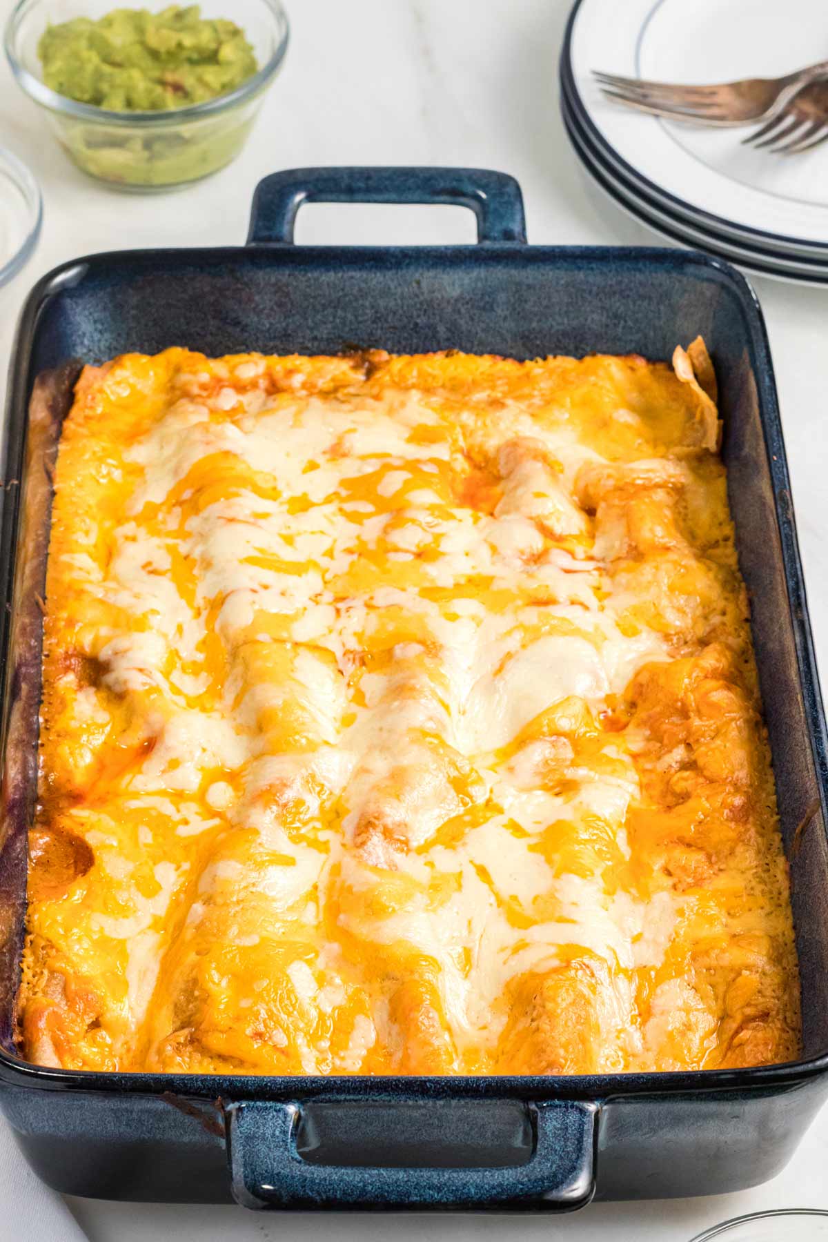 close-up shot of the enchiladas in a baking pan.