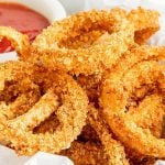 a basket of cajun onion rings.