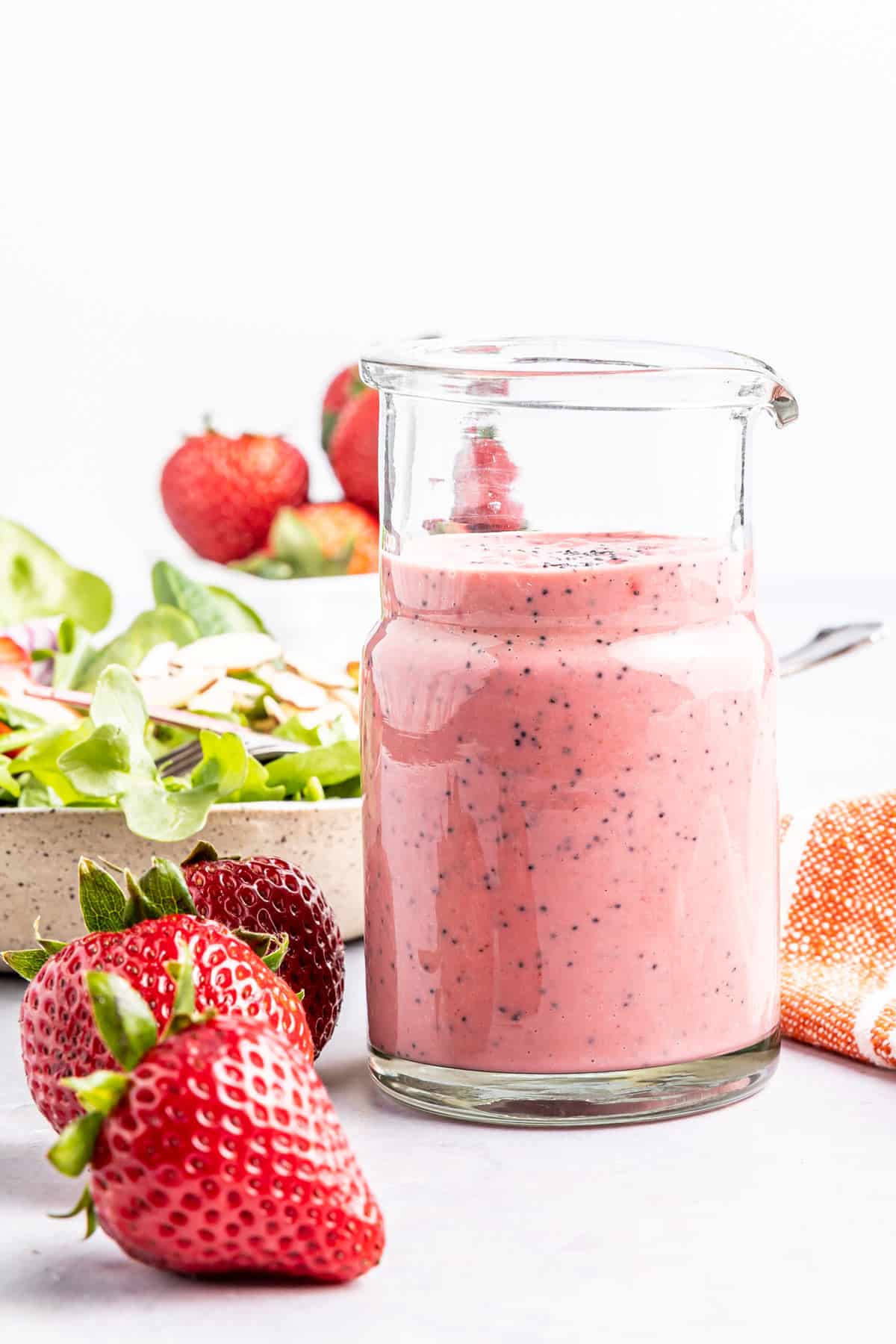 strawberry dressing in a glass container.