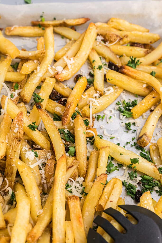 close-up shot of the fries on a sheet pan.