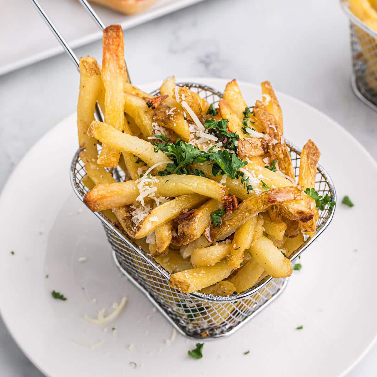a basket of garlic fries.
