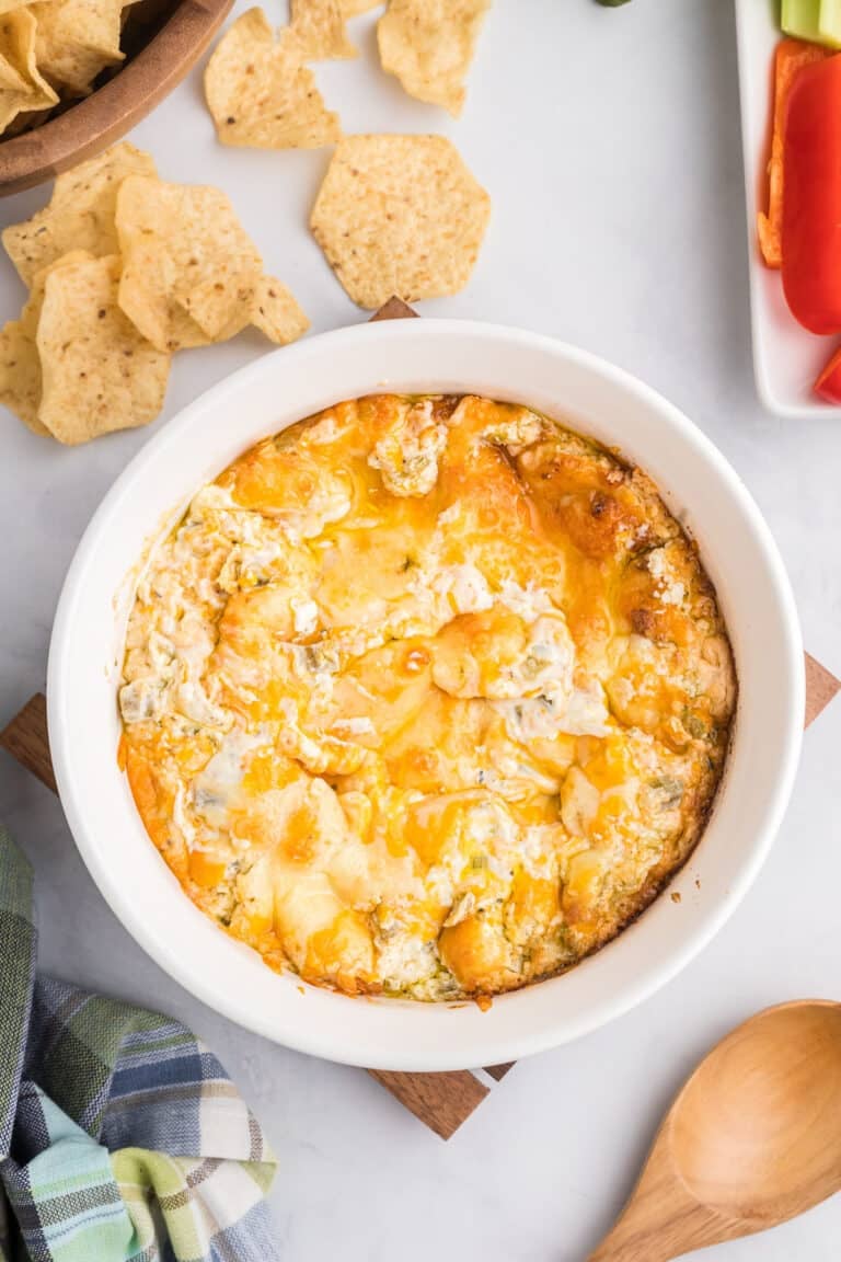 hot green chile cheese dip in a serving bowl.