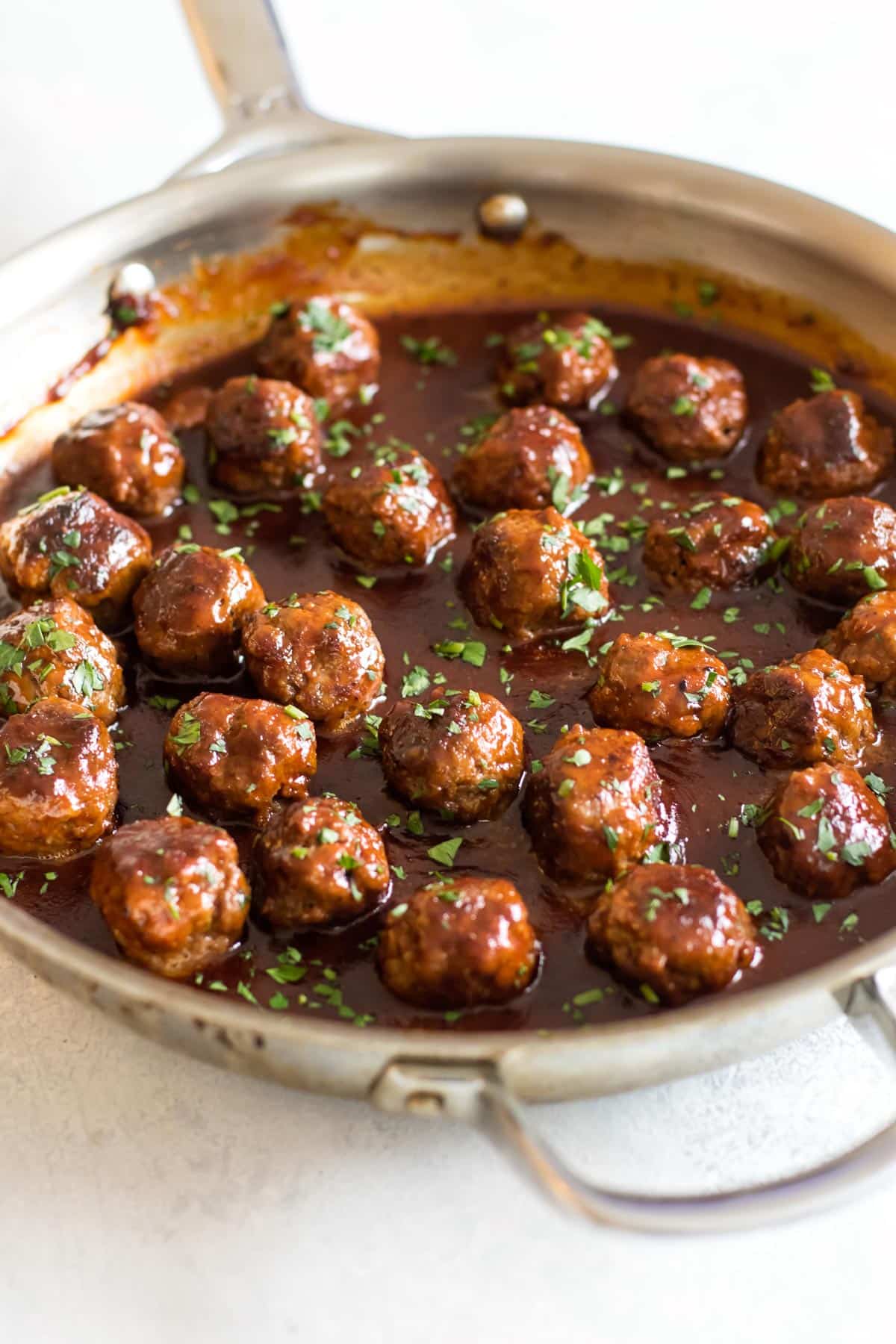 saucy meatballs in a pan.