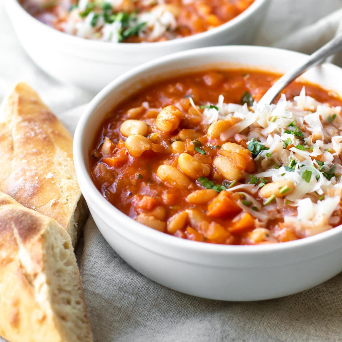 Italian white bean soup topped with parmesan cheese.