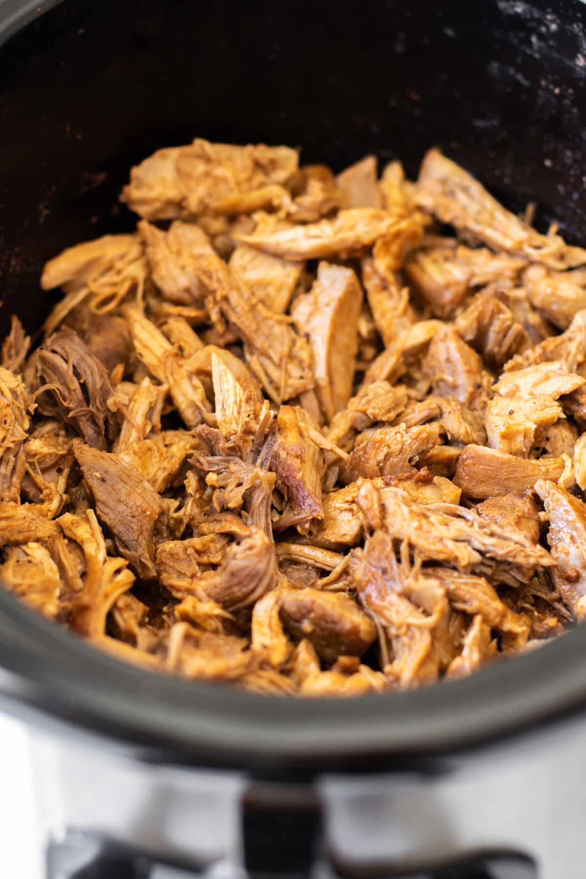 pulled pork in a slow cooker.