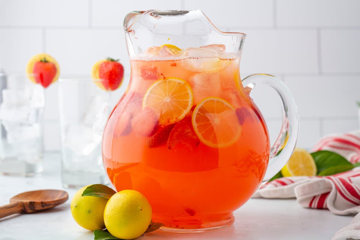a pitcher of strawberry lemonade.