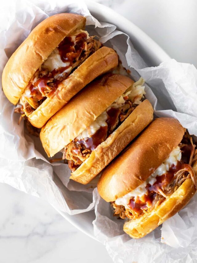 Pulled Pork Sandwiches (Slow Cooker) - Girl Gone Gourmet