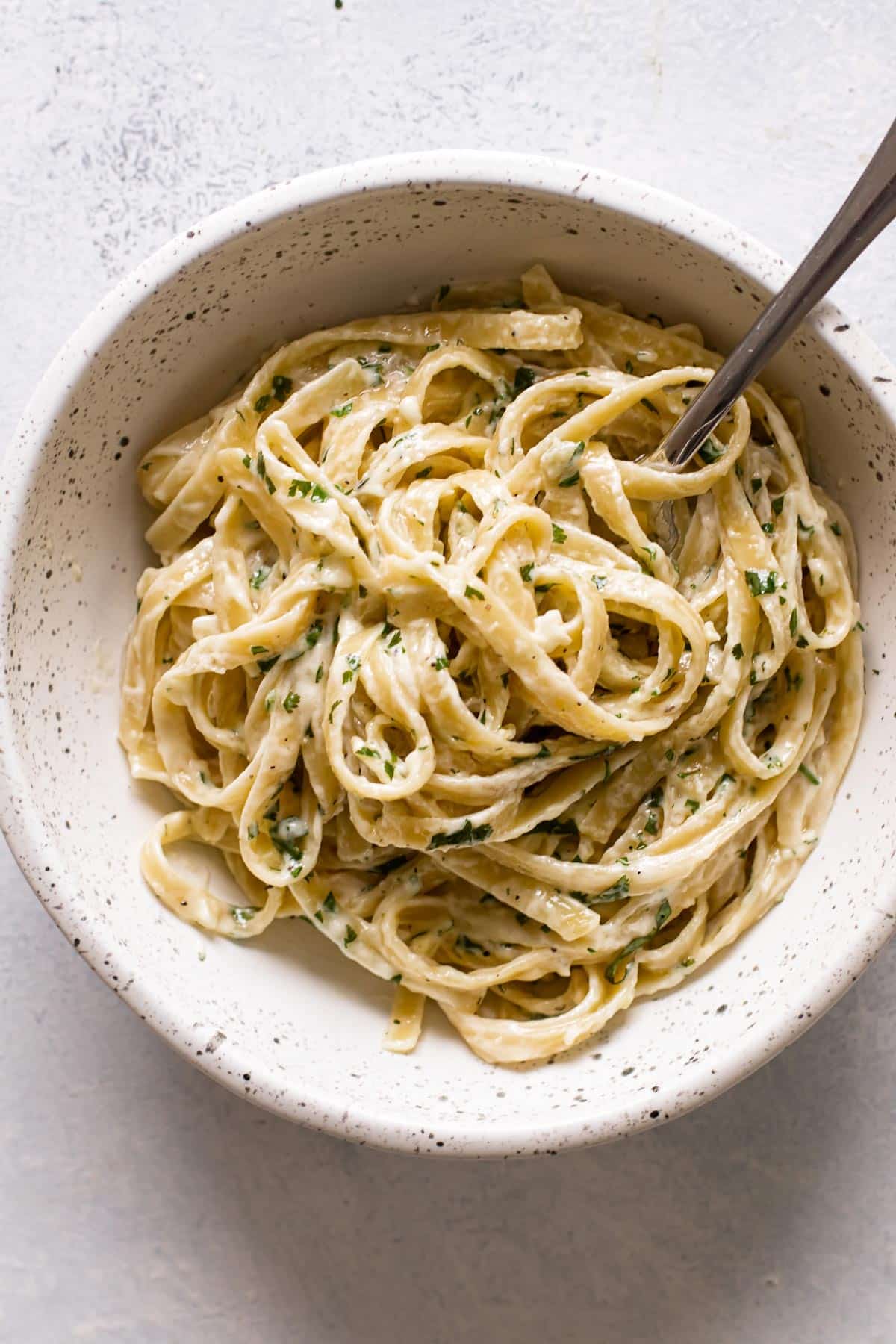 a bowl of creamy pasta.