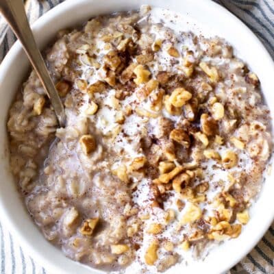 a bowl of oatmeal with a spoon.