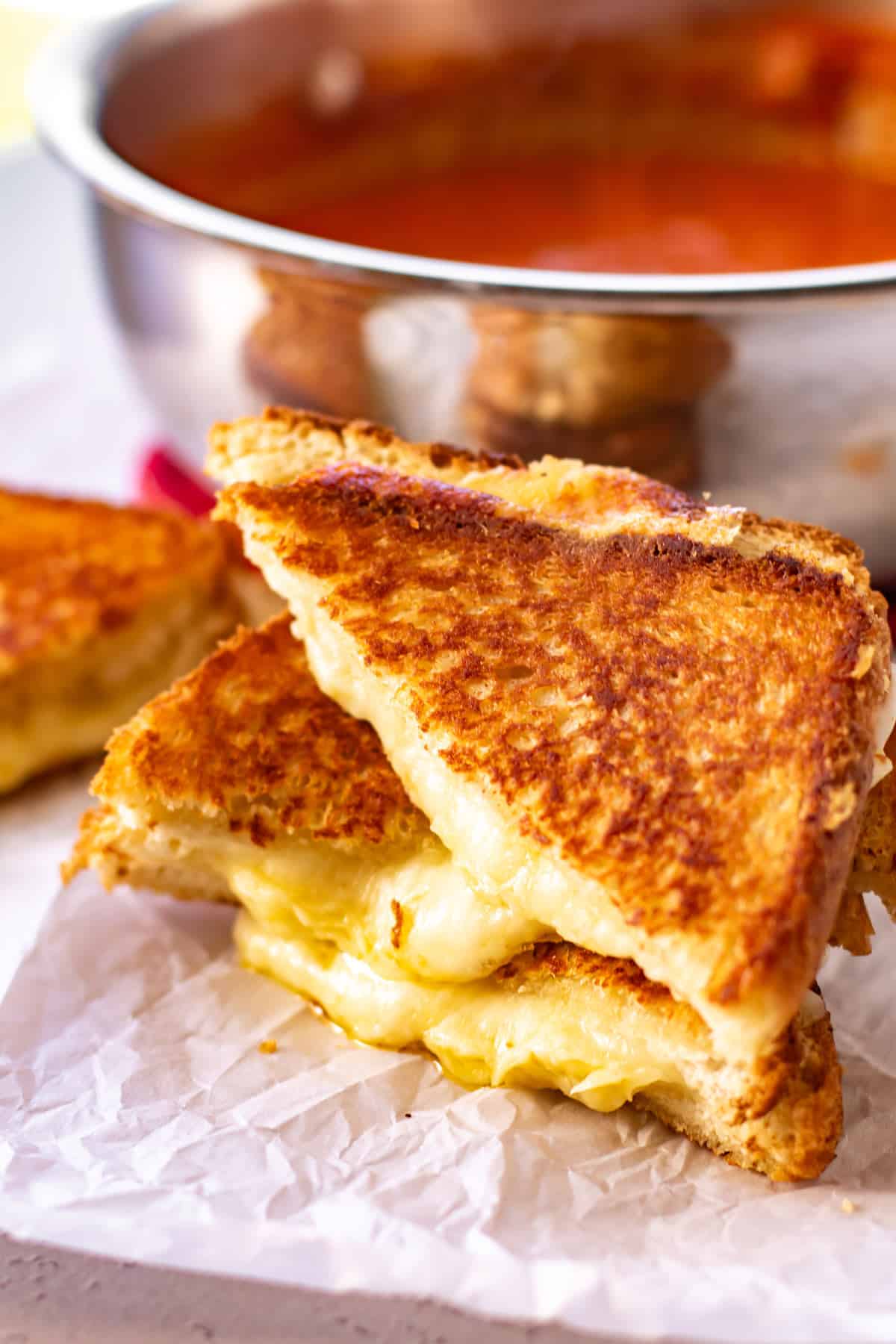 a stack of grilled cheese sandwiches.