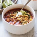 the chili in a bowl with toppings.