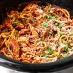 chicken ragu spaghetti in a slow cooker.