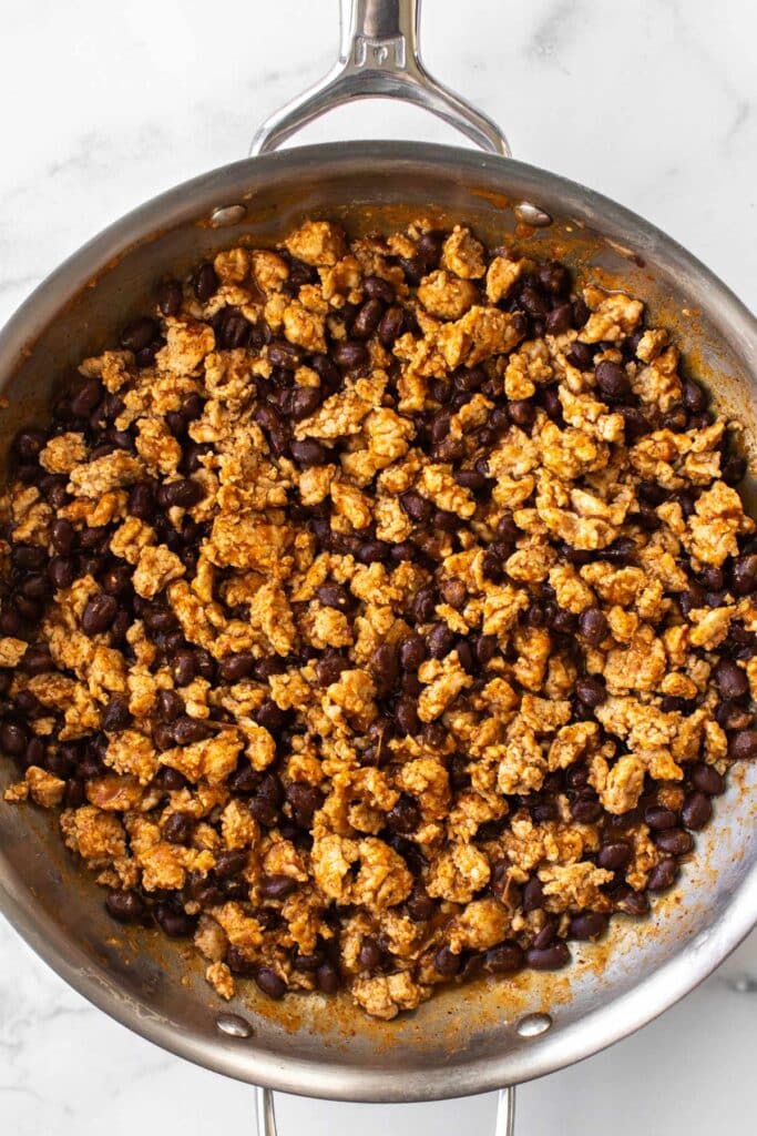 chicken and black bean taco filling in a pan.