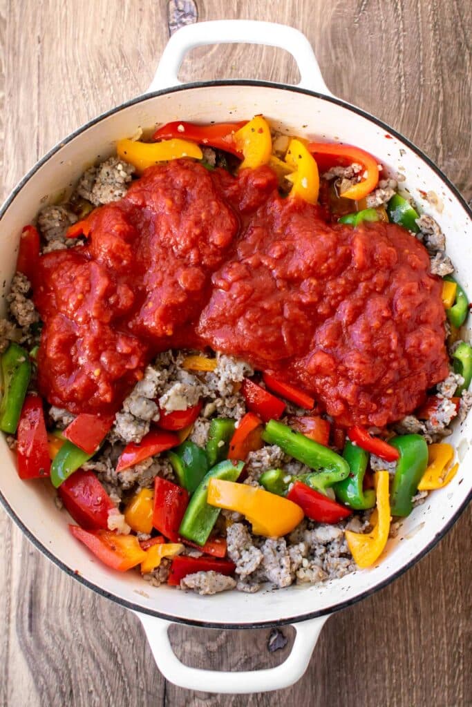 sauce added to the sausage and peppers.