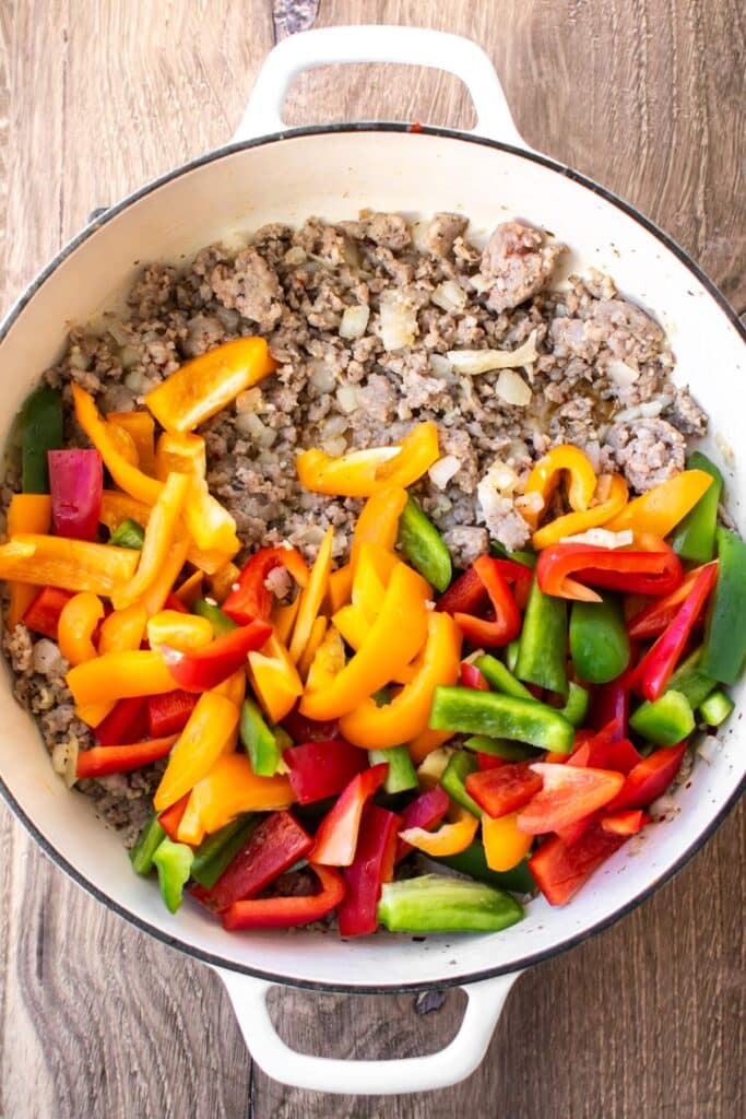 peppers added to the pan.