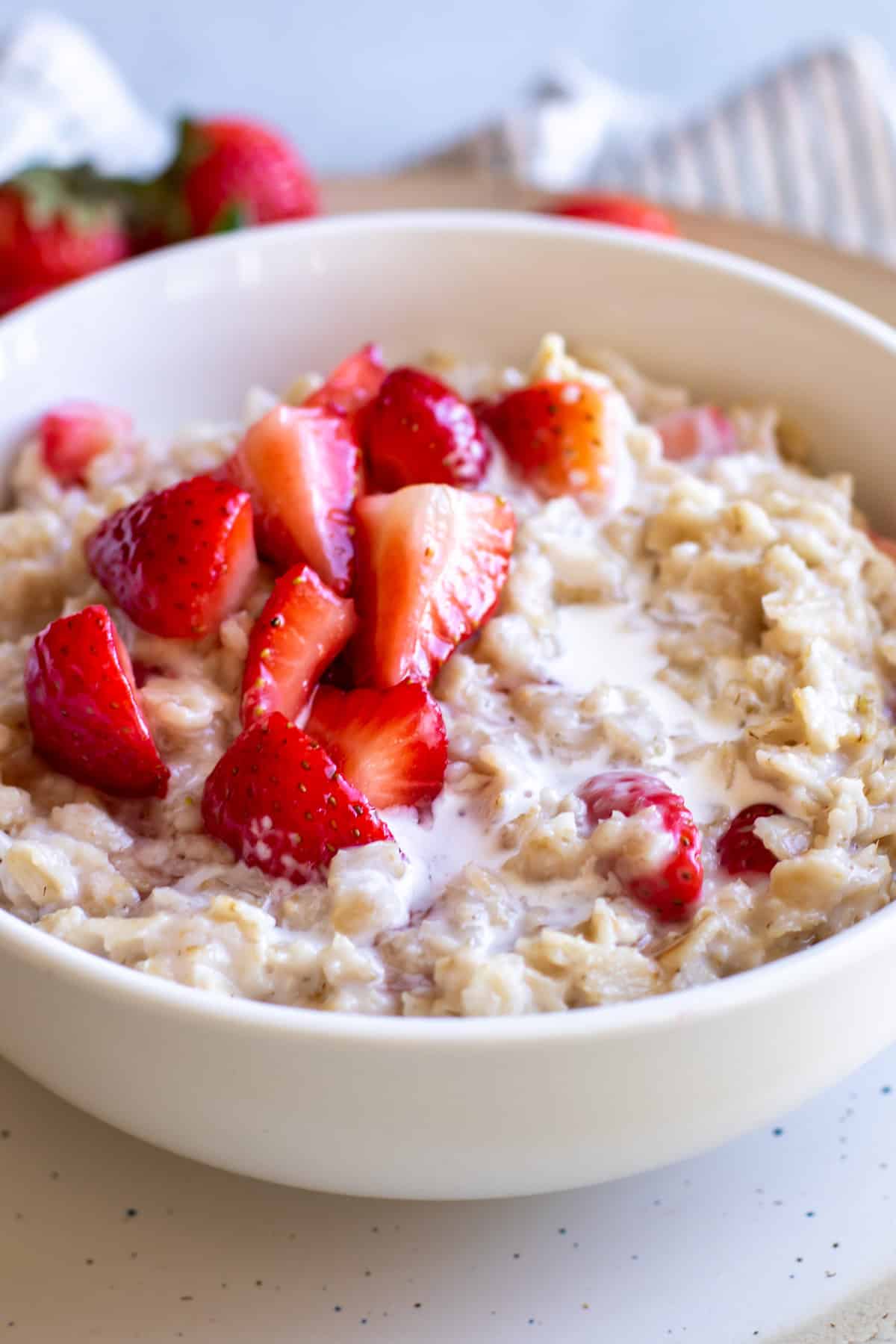 oatmeal topped with strawberries.