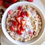 strawberry and cream oatmeal in a bowl.