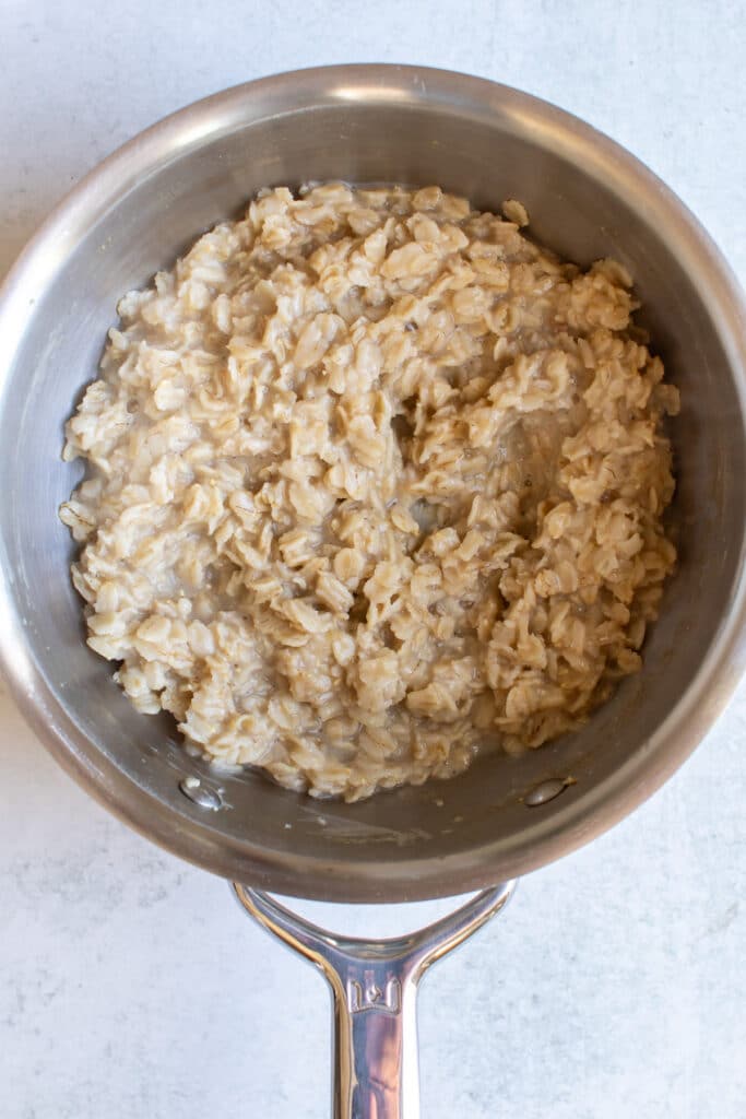 cooked oatmeal in a pan.