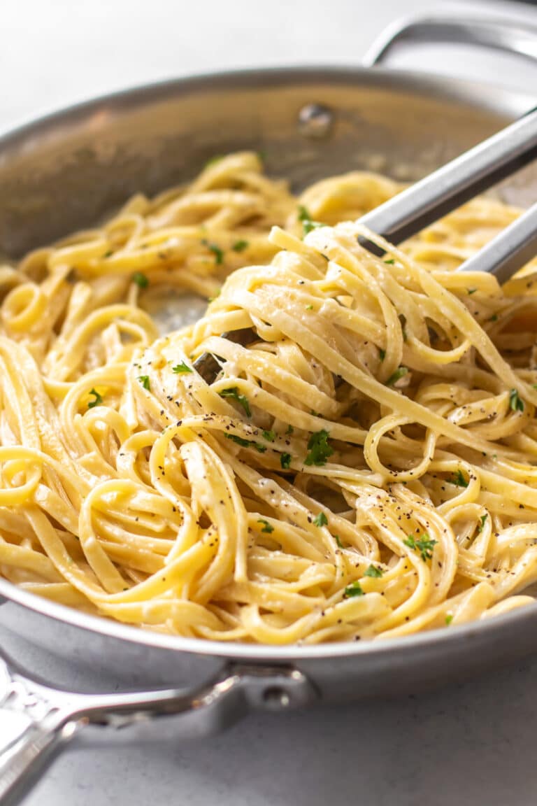 a pan of fettuccine alfredo.