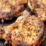 cooked pork chops in a pan.