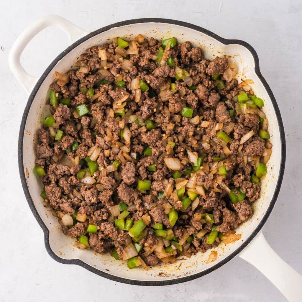 seasonings added to the skillet.