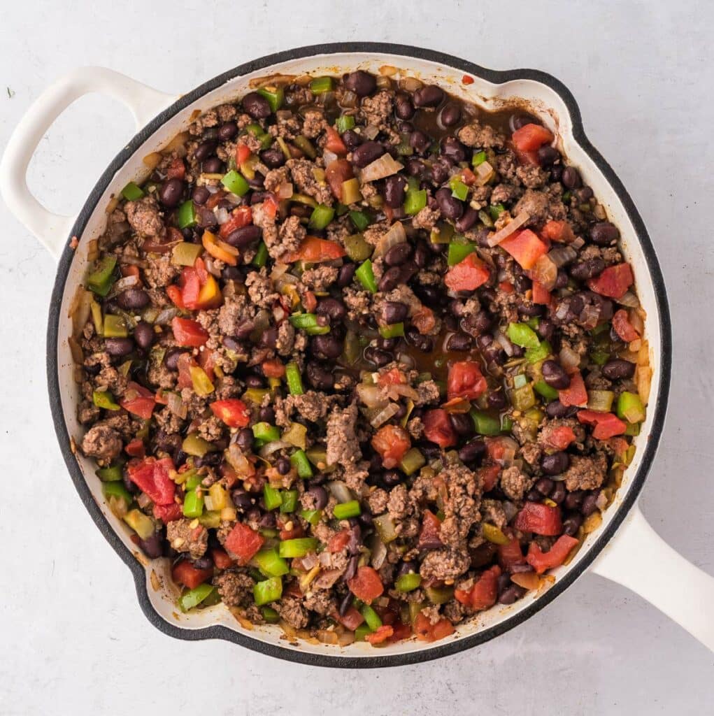 the beans added to the skillet.