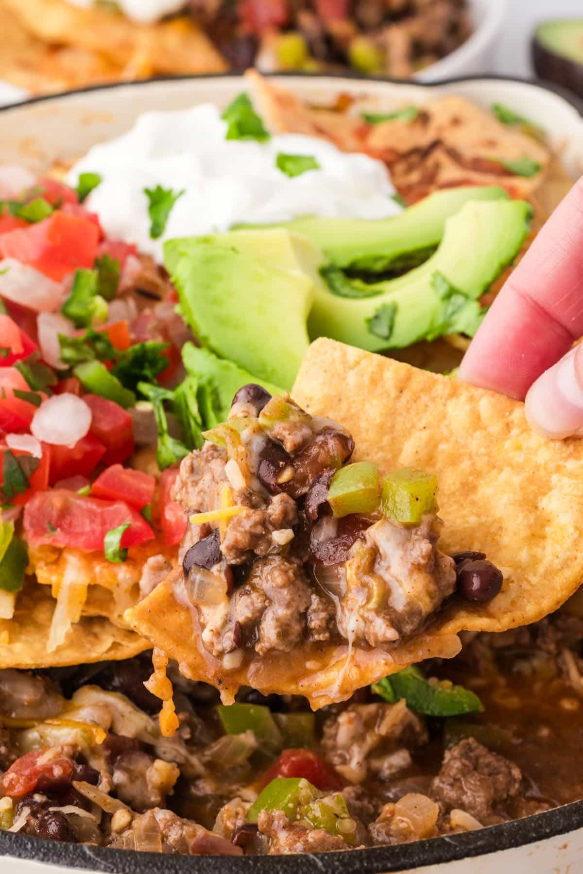a chip with a scoop of the filling.