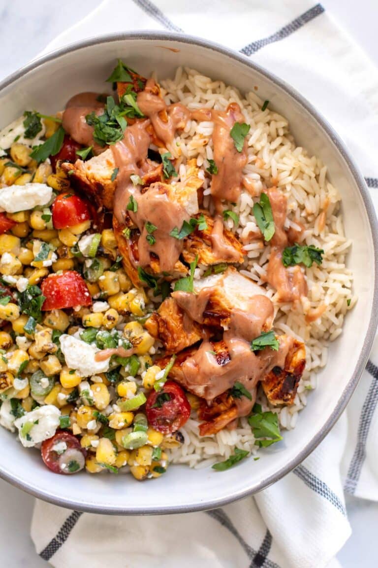 a BBQ chicken bowl with garnishes.