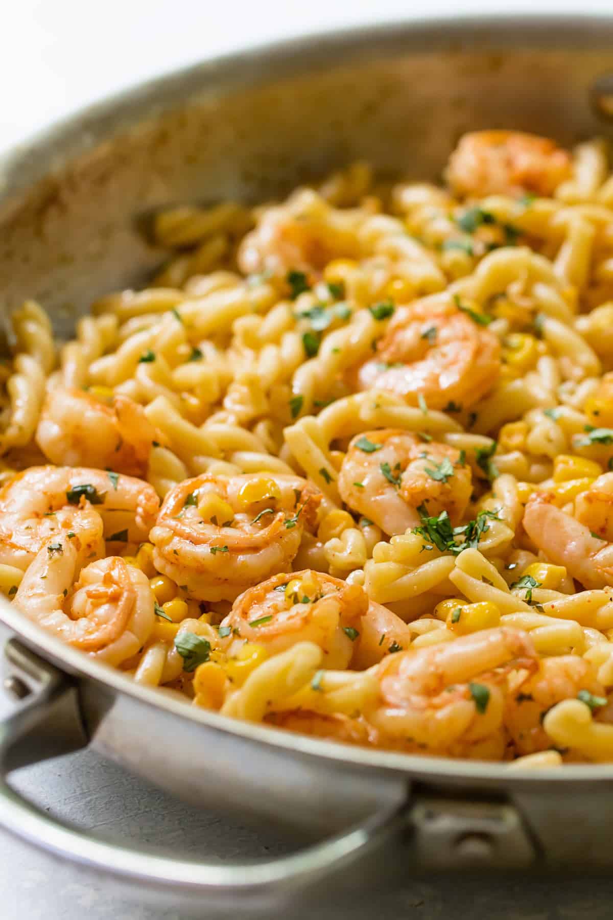 cilantro-lemon shrimp pasta in a pan.