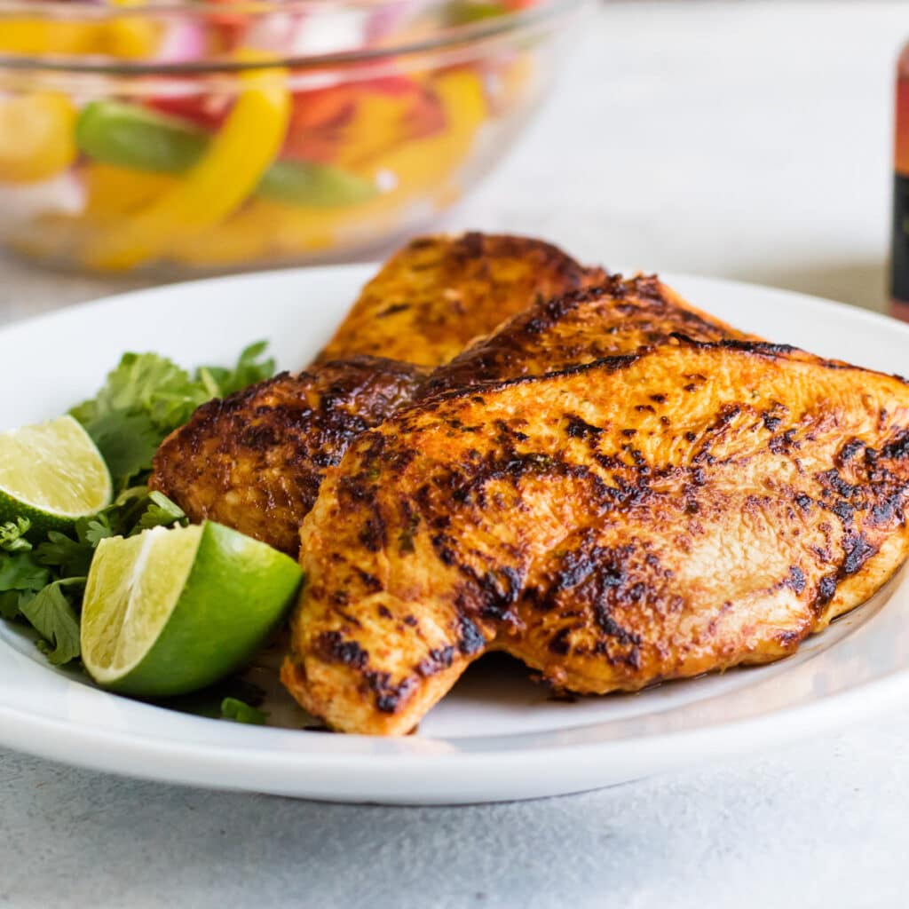 the cooked chicken on a plate.