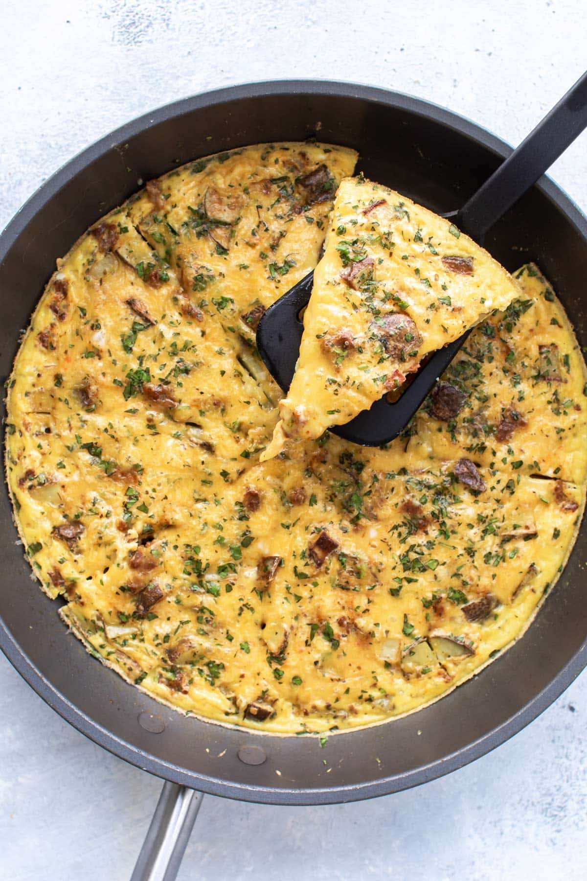 a slice being removed from the pan.