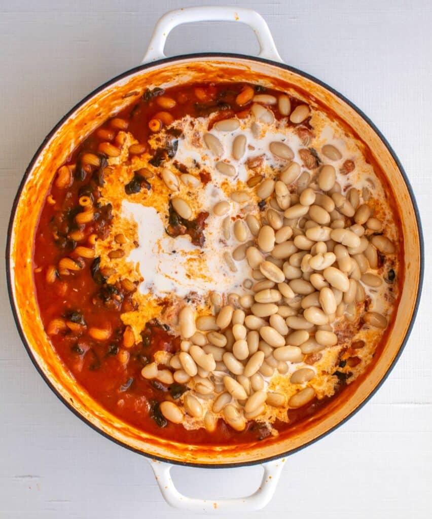 the cream and beans added to the pan.