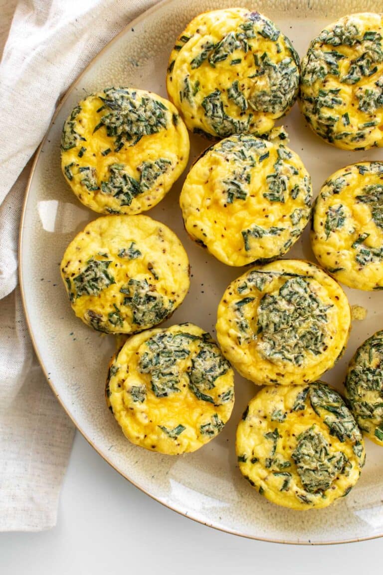 a plate of ricotta chive egg bites.