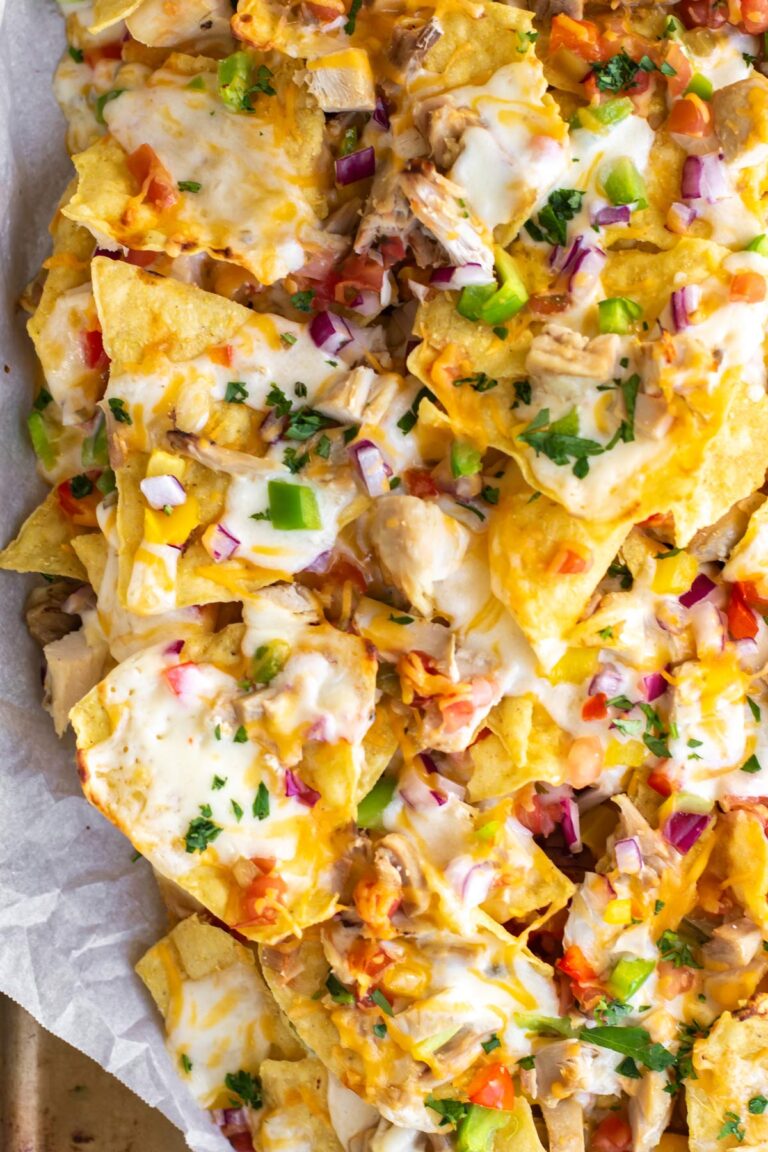 chicken fajita nachos on a sheet pan.