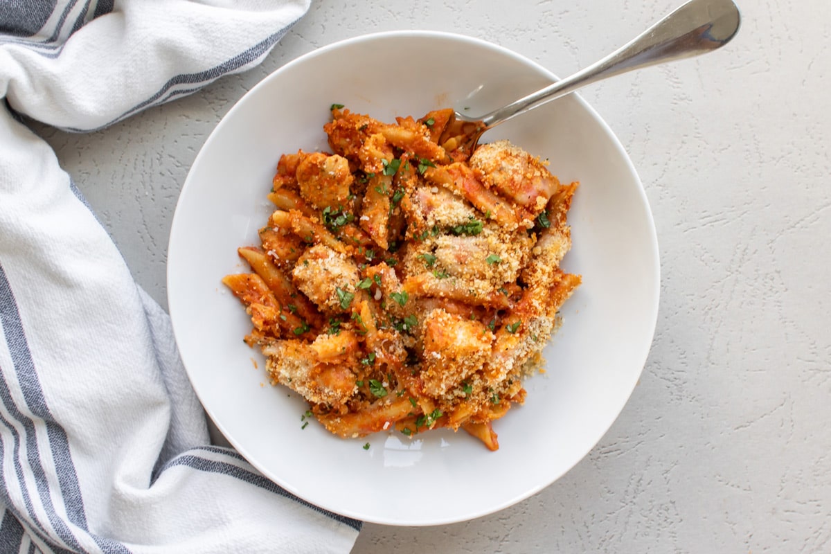 a bowl of chicken parm pasta.