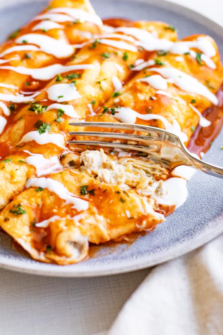 enchiladas on a plate.