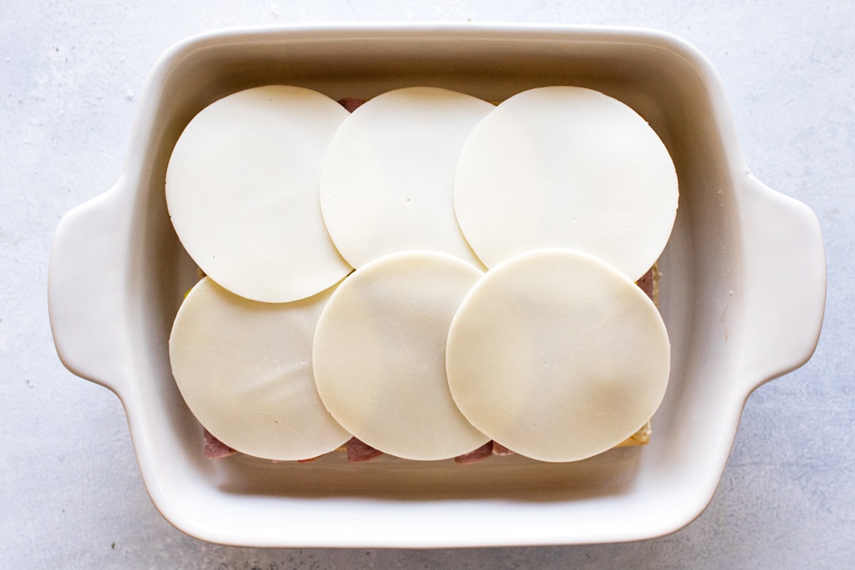 the sliced cheese on top.
